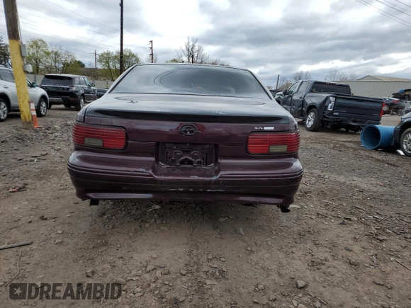 1995 Chevrolet Caprice with VIN 1G1BL52P0SR152620, listed as a Copart auction lot 53154365 with 223,365 mi miles and Salvage Title. Bid and sale history available at DreamBid. Image 6.