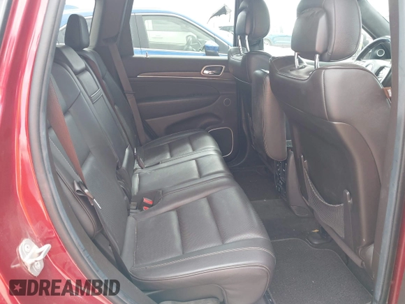 2014 Jeep Grand Cherokee Summit z VIN 1C4RJFJT4EC423217, wystawiony jako IAAI lot #42704059 z przebiegiem 245 928 mil mil oraz . Historia ofert i sprzedaży dostępna na DreamBid. Obrazek 8.