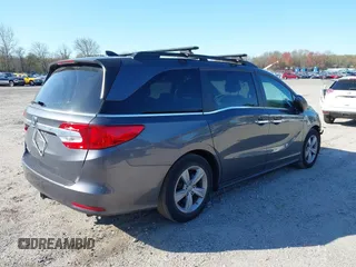 2020 Honda Odyssey EX with VIN 5FNRL6H54LB052660, listed as a IAAI auction lot 42051157 with 51,159 mi miles and . Bid and sale history available at DreamBid. Image 4.