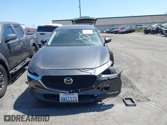 2021 Mazda CX-30 Select z VIN 3MVDMABL3MM233701, wystawiony jako IAAI lot #42086778 z przebiegiem Nie podano mil oraz . Historia ofert i sprzedaży dostępna na DreamBid. Obrazek 13.