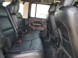 2021 Jeep Wrangler Unlimited Sahara с VIN 1C4HJXEG5MW731203, выставлен на аукционе Copart как лот 58005355 с пробегом 57 559 миль миль и Списание • Salvage title. История ставок и продаж доступна на DreamBid. Изображение 11.