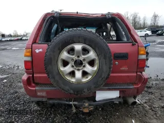 1998 Isuzu Rodeo S z VIN 4S2CM58W5W4350575, wystawiony jako Copart lot #84537714 z przebiegiem 215 573 mil mil oraz Szkoda całkowita • Salvage title. Historia ofert i sprzedaży dostępna na DreamBid. Obrazek 6.