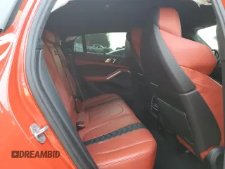 2021 BMW X6 M with VIN 5YMCY0C07M9H08985, listed as a Copart auction lot 88762065 with 0 mi miles and Salvage Title. Bid and sale history available at carsss.com. Image 10.