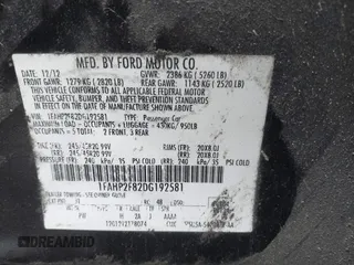 2013 Ford Taurus Limited with VIN 1FAHP2F82DG192581, listed as a IAAI auction lot 41490122 with 196,515 mi miles. Bid and sale history available at carsss.com. Image 9.