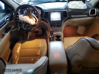 2017 Jeep Grand Cherokee Overland with VIN 1C4RJECG9HC965752, listed as a Copart auction lot 83874784 with 106,604 mi miles and Salvage Title. Bid and sale history available at carsss.com. Image 8.