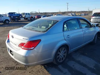 2007 Toyota Avalon XL with VIN 4T1BK36B97U243415, listed as a IAAI auction lot 41356904 with 127,873 mi miles. Bid and sale history available at carsss.com. Image 4.
