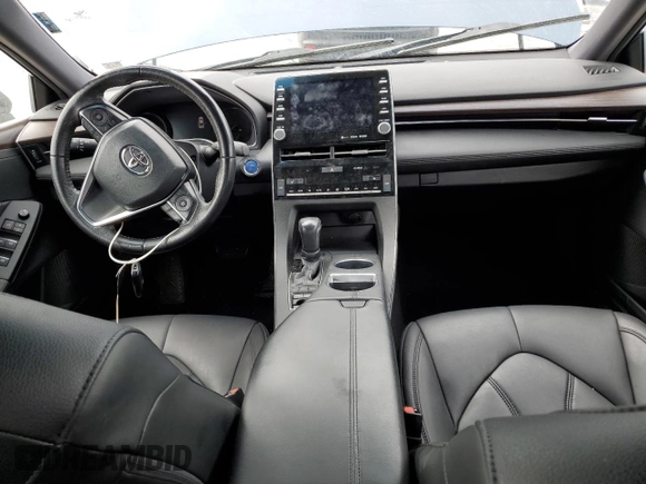 2020 Toyota Avalon Hybrid XLE z VIN 4T1A21FB8LU013231, wystawiony jako Copart lot #45410755 z przebiegiem 63 619 mil mil oraz Szkoda całkowita • Salvage title. Historia ofert i sprzedaży dostępna na DreamBid. Obrazek 8.