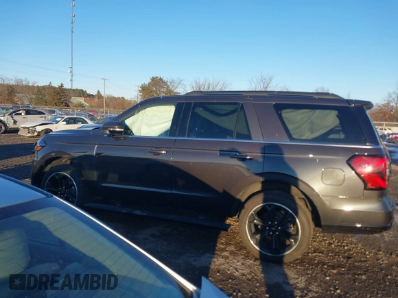 2023 Ford Expedition Limited with VIN 1FMJU2A89PEA48856, listed as a IAAI auction lot 41287594 with 13,891 mi miles. Bid and sale history available at carsss.com. Image 14.