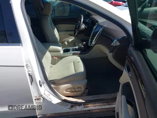 2013 Cadillac SRX Premium Collection with VIN 3GYFNEE33DS554556, listed as a IAAI auction lot 42152972 with 144,668 mi miles and . Bid and sale history available at DreamBid. Image 5.