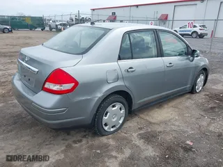 2009 Nissan Versa 1.8 S with VIN 3N1BC11E29L363158, listed as a IAAI auction lot 42070151 with 168,349 mi miles. Bid and sale history available at carsss.com. Image 4.