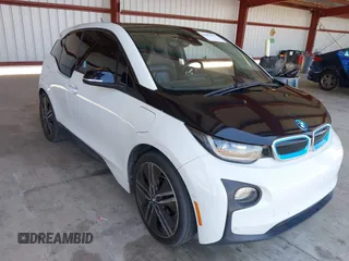 2015 BMW i3 z VIN WBY1Z4C5XFV279198, wystawiony jako IAAI lot #42855392 z przebiegiem 104 049 mil mil oraz . Historia ofert i sprzedaży dostępna na DreamBid. Obrazek 1.