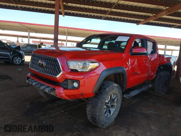 2018 Toyota Tacoma SR with VIN 3TMCZ5AN8JM141486, listed as a IAAI auction lot 42142145 with 54,851 mi miles and . Bid and sale history available at DreamBid. Image 6.