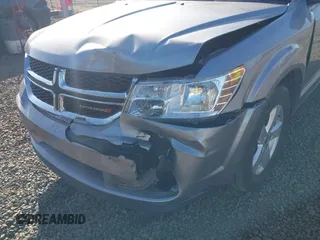 2018 Dodge Journey SE with VIN 3C4PDDAG9JT189824, listed as a IAAI auction lot 42208115 with 97,035 mi miles and . Bid and sale history available at DreamBid. Image 6.