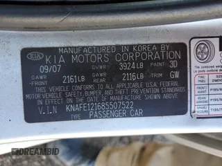2008 Kia Spectra EX with VIN KNAFE121685507522, listed as a Copart auction lot 57908235 with 143,894 mi miles and Salvage title. Bid and sale history available at DreamBid. Image 12.