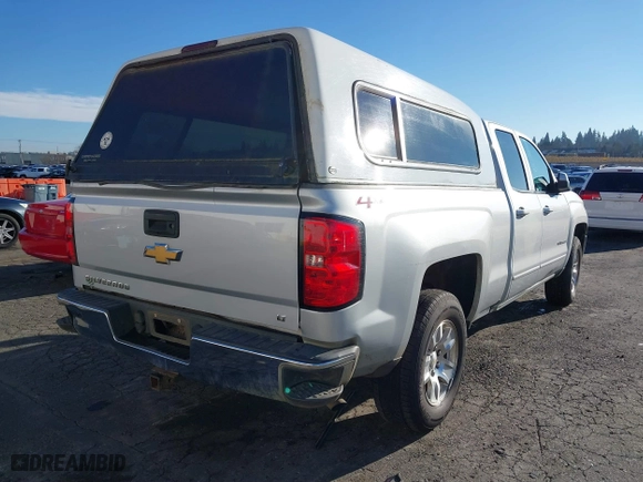 2018 Chevrolet Silverado 1500 LT with VIN 1GCVKREC0JZ157855, listed as a IAAI auction lot 41033669 with 127,315 mi miles. Bid and sale history available at carsss.com. Image 4.