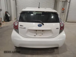 2014 Toyota Prius One z VIN JTDKDTB33E1558853, wystawiony jako Copart lot #57339425 z przebiegiem Nie podano mil oraz Nie do naprawy • Non repairable. Historia ofert i sprzedaży dostępna na DreamBid. Obrazek 6.