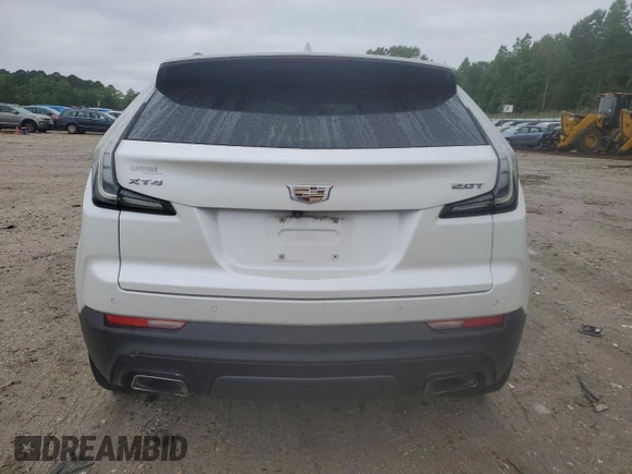 2019 Cadillac XT4 FWD Sport z VIN 1GYFZER49KF199885, wystawiony jako Copart lot #56836895 z przebiegiem 58 486 mil mil oraz Szkoda całkowita • Salvage title. Historia ofert i sprzedaży dostępna na DreamBid. Obrazek 6.