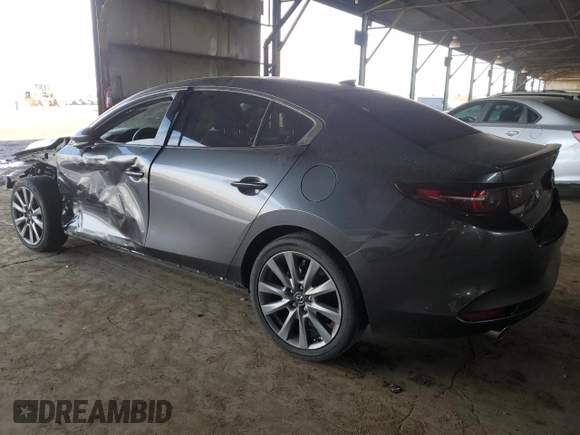 2021 Mazda 3 Premium with VIN JM1BPADL1M1305537, listed as a Copart auction lot 50722545 with 66,182 mi miles and Salvage title. Bid and sale history available at DreamBid. Image 2.
