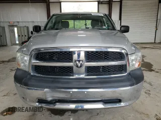 2012 Ram 1500 Tradesman z VIN 3C6JD7DT4CG110093, wystawiony jako Copart lot #53642215 z przebiegiem 110 996 mil mil oraz Szkoda całkowita • Salvage title. Historia ofert i sprzedaży dostępna na DreamBid. Obrazek 5.
