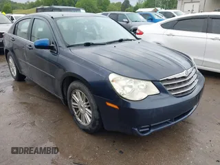 2007 Chrysler Sebring Touring z VIN 1C3LC56K37N644894, wystawiony jako IAAI lot #42326982 z przebiegiem 206 073 mil mil oraz . Historia ofert i sprzedaży dostępna na DreamBid. Obrazek 1.