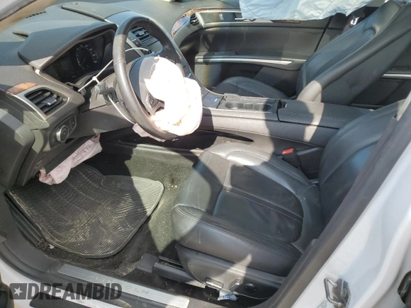 2013 Lincoln MKZ с VIN 3LN6L2JK3DR810768, выставлен на аукционе Copart как лот 56665585 с пробегом 172 770 миль миль и Списание • Salvage title. История ставок и продаж доступна на DreamBid. Изображение 7.