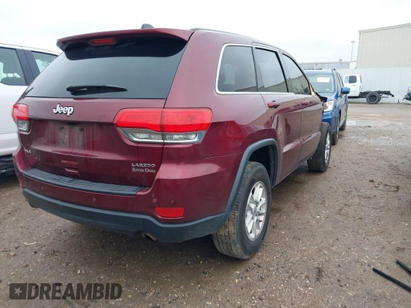 2018 Jeep Grand Cherokee Laredo E with VIN 1C4RJFAG6JC166137, listed as a IAAI auction lot 41416350 with 140,855 mi miles. Bid and sale history available at carsss.com. Image 4.