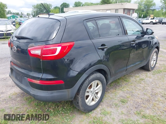2011 Kia Sportage LX with VIN KNDPBCA27B7081079, listed as a IAAI auction lot 42692993 with 517,338 mi miles and . Bid and sale history available at DreamBid. Image 4.