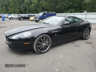 2005 Aston Martin DB9 z VIN SCFAD01A55GA01163, wystawiony jako Copart lot #63708663 z przebiegiem 44 924 mil mil oraz Szkody całkowita. Historia ofert i sprzedaży dostępna na DreamBid. Obrazek 1.