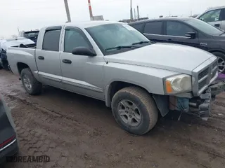 2005 Dodge Dakota Laramie with VIN 1D7HE58N05S244878, listed as a IAAI auction lot 41662513 with 171,323 mi miles. Bid and sale history available at carsss.com. Image 1.