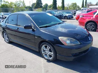 2004 Mitsubishi Lancer z VIN JA3AJ66F84U027928, wystawiony jako IAAI lot #42393975 z przebiegiem 163 980 mil mil oraz . Historia ofert i sprzedaży dostępna na DreamBid. Obrazek 1.