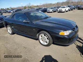 1998 Ford Mustang GT with VIN 1FAFP45X1WF216440, listed as a Copart auction lot 50876335 with 130,008 mi miles and Salvage Title. Bid and sale history available at carsss.com. Image 4.