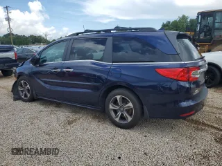 2019 Honda Odyssey Touring z VIN 5FNRL6H8XKB027156, wystawiony jako Copart lot #60735455 z przebiegiem 100 044 mil mil oraz Szkoda całkowita • Salvage title. Historia ofert i sprzedaży dostępna na DreamBid. Obrazek 2.