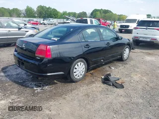 2004 Mitsubishi Galant ES z VIN 4A3AB36F94E138251, wystawiony jako IAAI lot #42064400 z przebiegiem 176 048 mil mil oraz . Historia ofert i sprzedaży dostępna na DreamBid. Obrazek 4.