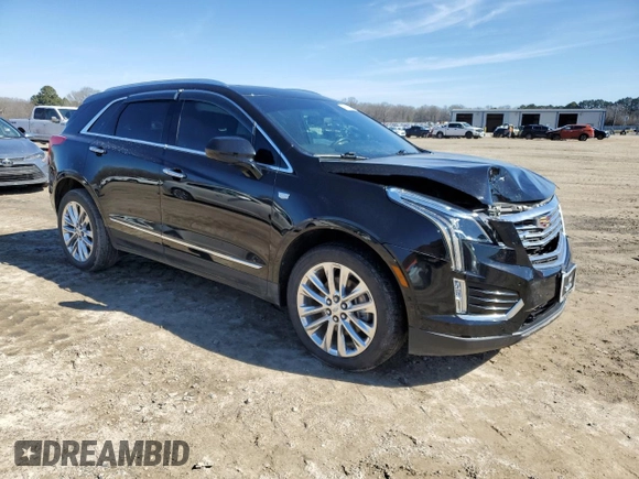 2017 Cadillac XT5 Platinum AWD with VIN 1GYKNFRS2HZ128548, listed as a Copart auction lot 46418065 with 118,071 mi miles and Salvage Title. Bid and sale history available at DreamBid. Image 4.