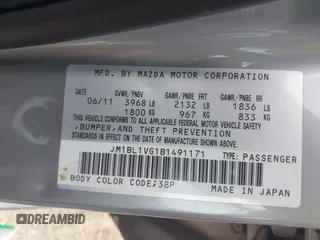 2011 Mazda Mazda3 i Touring with VIN JM1BL1VG1B1491171, listed as a IAAI auction lot 41886159 with 127,674 mi miles. Bid and sale history available at carsss.com. Image 9.