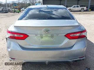 2020 Toyota Camry SE z VIN 4T1G11AK1LU308174, wystawiony jako IAAI lot #41675204 z przebiegiem 120 034 mil mil oraz . Historia ofert i sprzedaży dostępna na DreamBid. Obrazek 17.