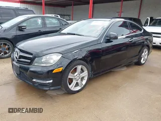 2015 Mercedes-Benz C-Class C 250 with VIN WDDGJ4HBXFG383850, listed as a IAAI auction lot 41809724 with 100,032 mi miles. Bid and sale history available at carsss.com. Image 2.