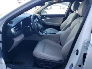 2023 Genesis G70 2.0T with VIN KMTG34TA9PU129246, listed as a Copart auction lot 60851434 with 12,407 mi miles and Non Repairable. Bid and sale history available at DreamBid. Image 7.