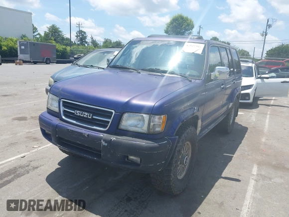 1998 Isuzu Trooper S with VIN JACDJ58X7W7914970, listed as a IAAI auction lot 42527384 with 178,470 mi miles and . Bid and sale history available at DreamBid. Image 2.
