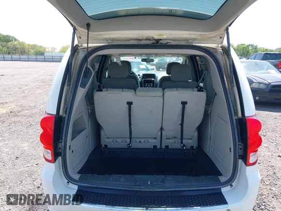 2012 Dodge Grand Caravan SXT with VIN 2C4RDGCG9CR200432, listed as a IAAI auction lot 42027477 with 99,076 mi miles and . Bid and sale history available at DreamBid. Image 17.