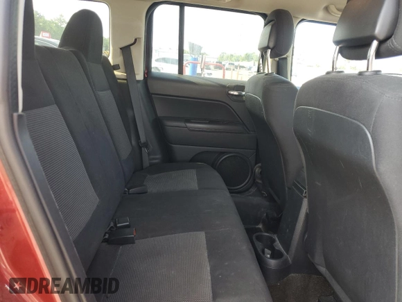 2014 Jeep Patriot Sport with VIN 1C4NJPBA7ED812056, listed as a Copart auction lot 60888345 with 113,243 mi miles and Salvage title. Bid and sale history available at DreamBid. Image 11.