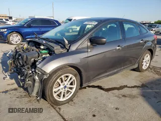 2018 Ford Focus SE z VIN 1FADP3F2XJL256272, wystawiony jako Copart lot #52651675 z przebiegiem 37 897 mil mil oraz Szkody całkowita. Historia ofert i sprzedaży dostępna na DreamBid. Obrazek 1.