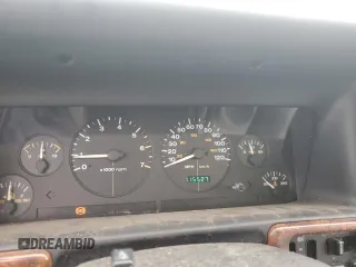1997 Jeep Grand Cherokee Limited with VIN 1J4GX78YXVC716353, listed as a Copart auction lot 85207974 with 115,527 mi miles and Salvage Title. Bid and sale history available at carsss.com. Image 9.