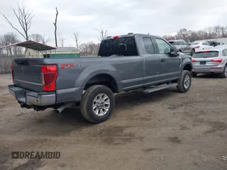 2021 Ford Super Duty F-250 SRW XL with VIN 1FT7X2B63MEC04131, listed as a IAAI auction lot 41864148 with 129,452 mi miles. Bid and sale history available at carsss.com. Image 4.