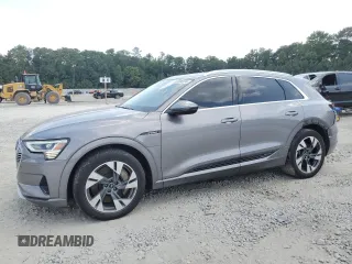 2021 Audi e-tron Premium with VIN WA1AAAGE7MB026088, listed as a Copart auction lot 67596704 with 25,580 mi miles and Salvage Title. Bid and sale history available at carsss.com. Image 1.