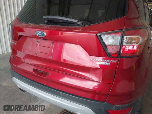 2017 Ford Escape Titanium with VIN 1FMCU9J91HUA32264, listed as a IAAI auction lot 42050273 with 201,128 mi miles. Bid and sale history available at carsss.com. Image 6.