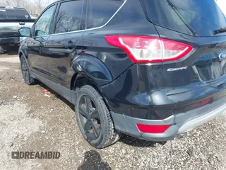 2015 Ford Escape SE z VIN 1FMCU0G73FUA15318, wystawiony jako IAAI lot #41797483 z przebiegiem 85 736 mil mil oraz . Historia ofert i sprzedaży dostępna na DreamBid. Obrazek 6.
