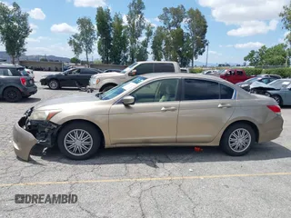 2008 Honda Accord LX z VIN JHMCP26318C025410, wystawiony jako IAAI lot #42244352 z przebiegiem 187 929 mil mil oraz . Historia ofert i sprzedaży dostępna na DreamBid. Obrazek 14.