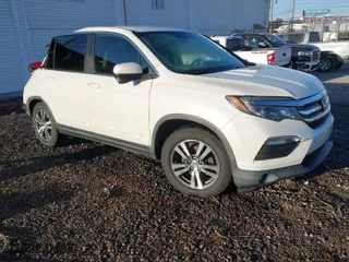 2016 Honda Pilot EX with VIN 5FNYF6H39GB003266, listed as a IAAI auction lot 40682948 with 155569 miles. Bid and sale history available at carsss.com. Image 1.