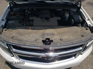 2019 Chevrolet Suburban LT with VIN 1GNSCHKCXKR207233, listed as a Copart auction lot 55410464 with 107,500 mi miles and Salvage Title. Bid and sale history available at DreamBid. Image 14.